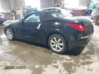 2004 Nissan 350Z Touring with VIN JN1AZ36AX4T014409, listed as a IAAI auction lot 41610945 with 86,756 mi miles. Bid and sale history available at carsss.com. Image 3.
