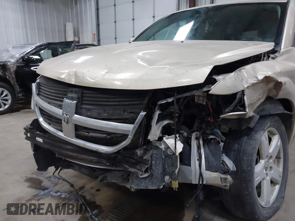 2010 Dodge Journey SXT with VIN 3D4PH5FVXAT180831, listed as a IAAI auction lot 41506328 with 155,482 mi miles. Bid and sale history available at carsss.com. Image 6.