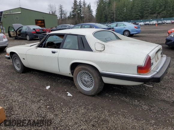 1989 Jaguar XJS z VIN SAJNA5840KC150684, wystawiony jako Copart lot #48081805 z przebiegiem 93 444 mil mil oraz Czysty tytuł • Clean title. Historia ofert i sprzedaży dostępna na DreamBid. Obrazek 2.
