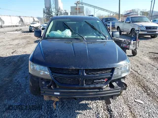 2018 Dodge Journey SE z VIN 3C4PDCAB9JT243816, wystawiony jako IAAI lot #41982817 z przebiegiem 173 092 mil mil oraz . Historia ofert i sprzedaży dostępna na DreamBid. Obrazek 11.