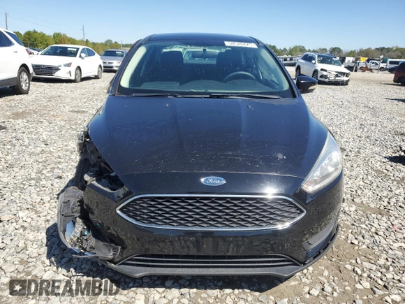 2017 Ford Focus SE with VIN 1FADP3F24HL248615, listed as a Copart auction lot 50526875 with 96,008 mi miles and Salvage Title. Bid and sale history available at DreamBid. Image 5.