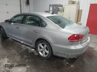 2013 Volkswagen Passat SE w/Sunroof & Nav with VIN 1VWBP7A30DC150018, listed as a IAAI auction lot 41580416 with 75,231 mi miles. Bid and sale history available at carsss.com. Image 3.