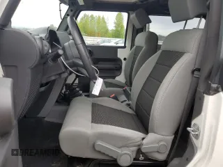 2010 Jeep Wrangler Sport with VIN 1J4AA2D12AL130050, listed as a Copart auction lot 54736025 with 48,262 mi miles and Salvage Title. Bid and sale history available at carsss.com. Image 7.