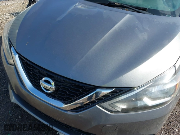 2018 Nissan Sentra S with VIN 3N1AB7AP3JY218818, listed as a IAAI auction lot 41929535 with 200,156 mi miles and . Bid and sale history available at DreamBid. Image 10.