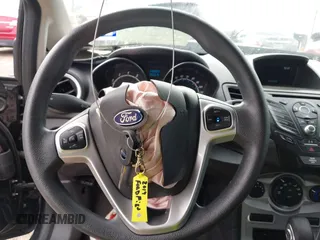 2019 Ford Fiesta SE z VIN 3FADP4BJ7KM158142, wystawiony jako IAAI lot #41510806 z przebiegiem 55 315 mil mil oraz . Historia ofert i sprzedaży dostępna na DreamBid. Obrazek 11.