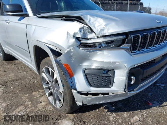 2021 Jeep Grand Cherokee Overland with VIN 1C4RJKDG0M8122002, listed as a IAAI auction lot 41748944 with 88,336 mi miles and . Bid and sale history available at DreamBid. Image 6.