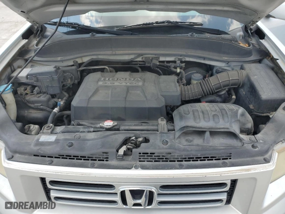 2006 Honda Ridgeline RTL with VIN 2HJYK16516H562690, listed as a Copart auction lot 66073094 with 211,924 mi miles and Salvage Title. Bid and sale history available at carsss.com. Image 11.