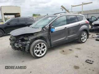 2013 Ford Escape Titanium z VIN 1FMCU0J98DUB64363, wystawiony jako Copart lot #54772925 z przebiegiem 109 956 mil mil oraz Szkody całkowita. Historia ofert i sprzedaży dostępna na DreamBid. Obrazek 1.