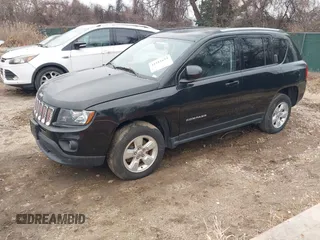 2016 Jeep Compass Latitude with VIN 1C4NJCEBXGD642680, listed as a IAAI auction lot 41511653 with 122,742 mi miles. Bid and sale history available at carsss.com. Image 2.