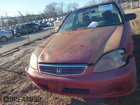 1999 Honda Civic LX with VIN 1HGEJ6579XL014663, listed as a IAAI auction lot 41250453 with 251,342 mi miles. Bid and sale history available at carsss.com. Image 12.