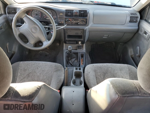 2000 Isuzu Rodeo S z VIN 4S2CK58W2Y4311726, wystawiony jako Copart lot #85070364 z przebiegiem 226 510 mil mil oraz Szkody całkowita. Historia ofert i sprzedaży dostępna na DreamBid. Obrazek 8.