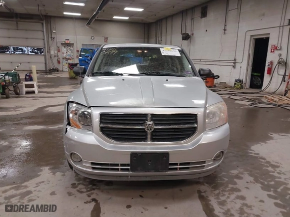 2007 Dodge Caliber SXT with VIN 1B3HB48B07D513778, listed as a IAAI auction lot 41260699 with NaN miles. Bid and sale history available at carsss.com. Image 12.