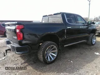 2019 Chevrolet Silverado 1500 High Country with VIN 1GCUYHEL1KZ360808, listed as a IAAI auction lot 42106243 with 158,061 mi miles. Bid and sale history available at carsss.com. Image 4.