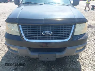 2003 Ford Expedition XLT Value z VIN 1FMPU16W63LA50775, wystawiony jako IAAI lot #42029150 z przebiegiem 296 065 mil mil oraz . Historia ofert i sprzedaży dostępna na DreamBid. Obrazek 12.