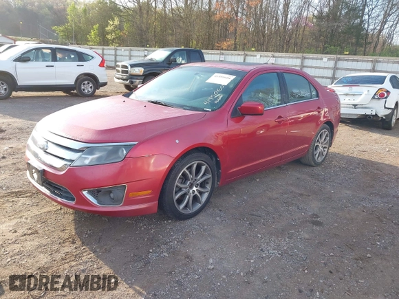 2011 Ford Fusion SE with VIN 3FAHP0HGXBR199597, listed as a IAAI auction lot 41950604 with 184,668 mi miles. Bid and sale history available at carsss.com. Image 2.