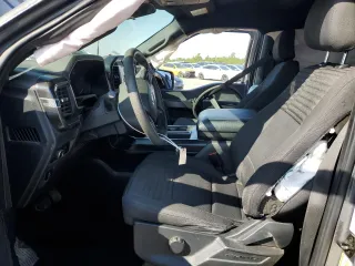 2023 Ford F-150 XL with VIN 1FTEW1CP4PKD21685, listed as a Copart auction lot 54992615 with 27,252 mi miles and Salvage title. Bid and sale history available at DreamBid. Image 7.