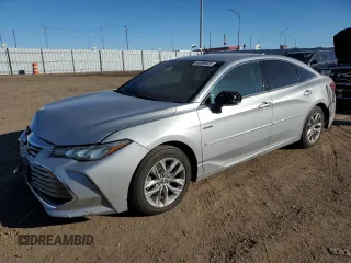 2021 Toyota Avalon Hybrid XLE z VIN 4T1JA1AB4MU001475, wystawiony jako Copart lot #46989525 z przebiegiem 173 287 mil mil oraz Czysty tytuł • Clean title. Historia ofert i sprzedaży dostępna na DreamBid. Obrazek 1.