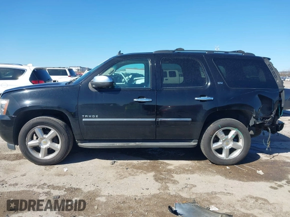 2013 Chevrolet Tahoe LTZ with VIN 1GNSKCE0XDR350970, listed as a IAAI auction lot 41704253 with 126,653 mi miles and . Bid and sale history available at DreamBid. Image 15.