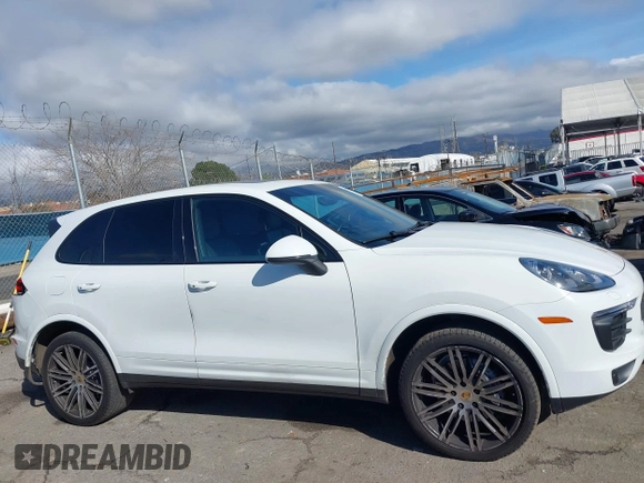 2017 Porsche Cayenne with VIN WP1AA2A23HKA80695, listed as a IAAI auction lot 41532359 with 71,628 mi miles. Bid and sale history available at carsss.com. Image 14.