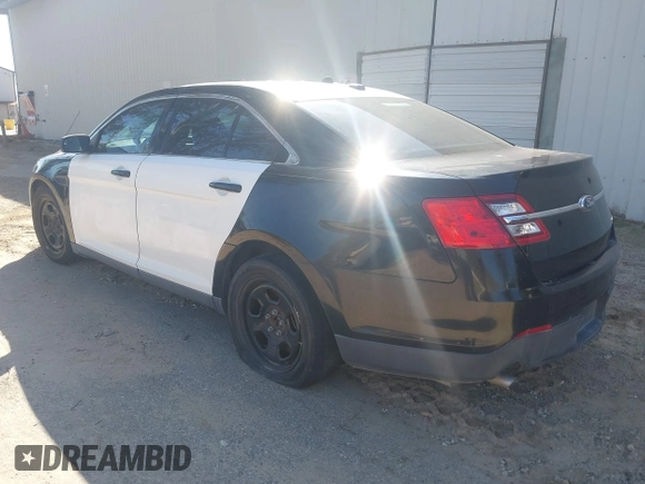 2014 Ford Police Interceptor with VIN 1FAHP2MK4EG124301, listed as a IAAI auction lot 41596193 with 101,314 mi miles and . Bid and sale history available at DreamBid. Image 3.