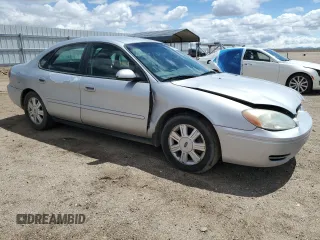 2007 Ford Taurus SEL z VIN 1FAFP56UX7A156005, wystawiony jako Copart lot #54691695 z przebiegiem 152 197 mil mil oraz Szkoda całkowita • Salvage title. Historia ofert i sprzedaży dostępna na DreamBid. Obrazek 4.