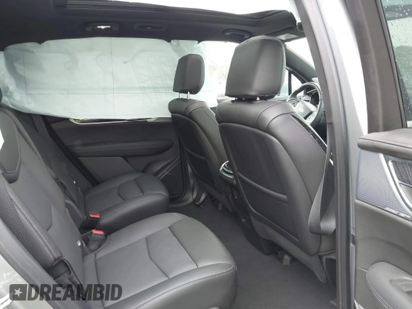 2024 Cadillac XT6 FWD Premium Luxury with VIN 1GYKPCRS0RZ748048, listed as a IAAI auction lot 42043117 with 7,232 mi miles. Bid and sale history available at carsss.com. Image 8.