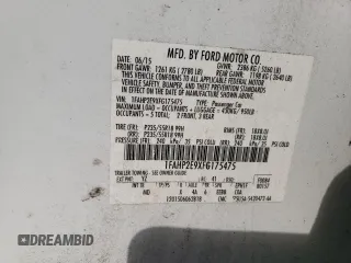 2015 Ford Taurus SEL with VIN 1FAHP2E9XFG175475, listed as a Copart auction lot 82369004 with 150,708 mi miles and Salvage title. Bid and sale history available at DreamBid. Image 14.