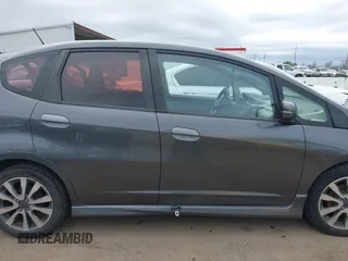 2012 Honda Fit Sport with VIN JHMGE8H50CC035136, listed as a IAAI auction lot 41657267 with 331,783 mi miles. Bid and sale history available at carsss.com. Image 13.
