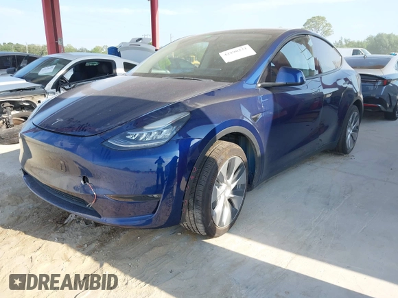 2022 Tesla Model Y Long Range z VIN 7SAYGAEE2NF364733, wystawiony jako IAAI lot #42290231 z przebiegiem 33 907 mil mil oraz . Historia ofert i sprzedaży dostępna na DreamBid. Obrazek 17.