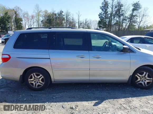2007 Honda Odyssey EX-L with VIN 5FNRL387X7B080906, listed as a IAAI auction lot 41910061 with 229,717 mi miles and . Bid and sale history available at DreamBid. Image 13.