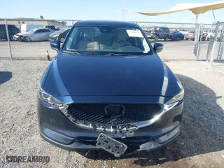 2017 Mazda CX-5 Touring with VIN JM3KFACL5H0180243, listed as a IAAI auction lot 41990818 with 158,977 mi miles. Bid and sale history available at carsss.com. Image 12.