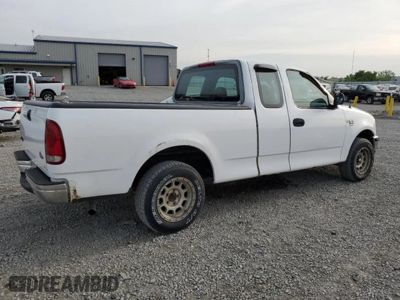 1998 Ford F-150 with VIN 1FTZX17W2WKB25677, listed as a Copart auction lot 54419145 with 319,584 mi miles and Salvage title. Bid and sale history available at DreamBid. Image 3.