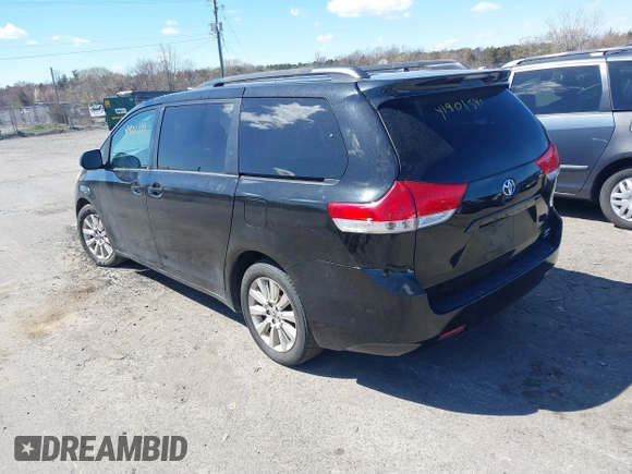 2012 Toyota Sienna XLE with VIN 5TDDK3DC1CS047105, listed as a IAAI auction lot 41901541 with 176,476 mi miles. Bid and sale history available at carsss.com. Image 3.