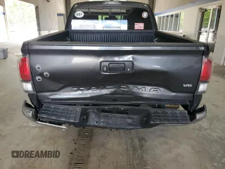 2021 Toyota Tacoma SR with VIN 3TMCZ5ANXMM425903, listed as a Copart auction lot 57963425 with 61,458 mi miles and Salvage title. Bid and sale history available at DreamBid. Image 6.
