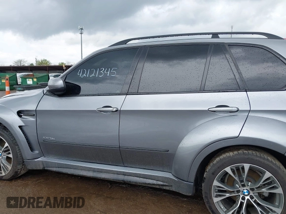 2011 BMW X5 35d z VIN 5UXZW0C52BL661879, wystawiony jako IAAI lot #42121345 z przebiegiem 131 036 mil mil oraz . Historia ofert i sprzedaży dostępna na DreamBid. Obrazek 14.