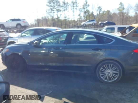 2015 Ford Fusion SE with VIN 3FA6P0H92FR100897, listed as a IAAI auction lot 41870271 with 195,182 mi miles and . Bid and sale history available at DreamBid. Image 14.