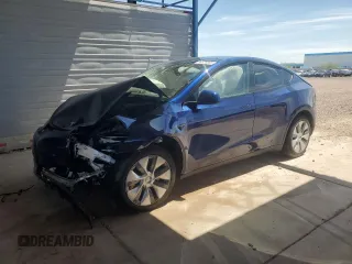 2023 Tesla Model Y Long Range with VIN 7SAYGDEE7PA112865, listed as a Copart auction lot 54626685 with 10,720 mi miles and Salvage Title. Bid and sale history available at DreamBid. Image 1.