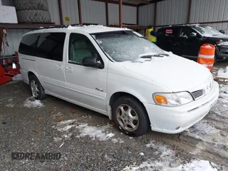 2001 Oldsmobile Silhouette Premiere Edition z VIN 1GHDX13E41D131656, wystawiony jako IAAI lot #41556845 z przebiegiem 249 961 mil mil oraz . Historia ofert i sprzedaży dostępna na DreamBid. Obrazek 1.