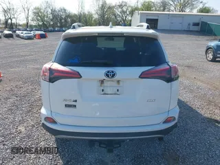 2018 Toyota RAV4 XLE with VIN 2T3WFREV2JW412970, listed as a IAAI auction lot 41986122 with 61,828 mi miles. Bid and sale history available at carsss.com. Image 16.