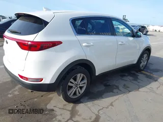 2019 Kia Sportage LX with VIN KNDPM3AC0K7535675, listed as a IAAI auction lot 41933482 with 118,012 mi miles and . Bid and sale history available at DreamBid. Image 4.