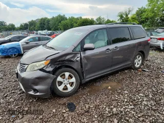 2014 Toyota Sienna LE AAS with VIN 5TDKK3DC6ES410945, listed as a Copart auction lot 64188915 with 136,071 mi miles and Salvage title. Bid and sale history available at DreamBid. Image 1.