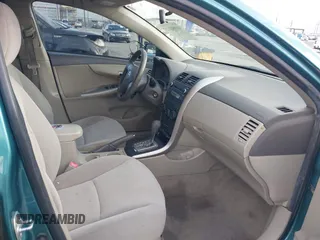 2010 Toyota Corolla with VIN JTDBU4EE4A9104965, listed as a IAAI auction lot 41956372 with 206,535 mi miles. Bid and sale history available at carsss.com. Image 5.