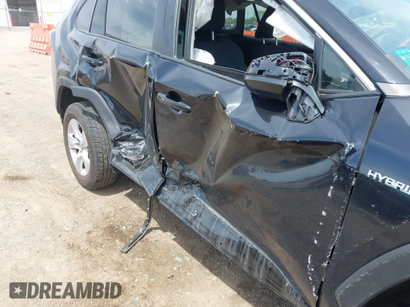 2021 Toyota RAV4 Hybrid LE with VIN 2T3L6RFV7MW011159, listed as a IAAI auction lot 42212998 with 104,626 mi miles and . Bid and sale history available at DreamBid. Image 6.