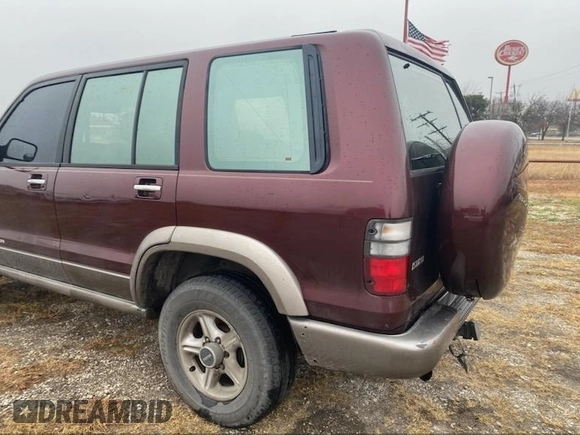 2002 Isuzu Trooper S with VIN JACDS58X727J02138, listed as a IAAI auction lot 41455245 with 186,560 mi miles and . Bid and sale history available at DreamBid. Image 3.