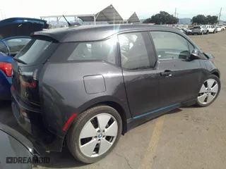 2014 BMW i3 with VIN WBY1Z4C53EV272852, listed as a IAAI auction lot 40131624 with 38,490 mi miles. Bid and sale history available at carsss.com. Image 4.