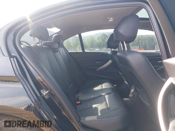 2013 BMW 3 Series 320i xDrive with VIN WBA3C3C50DF981864, listed as a IAAI auction lot 42599429 with 155,150 mi miles and . Bid and sale history available at DreamBid. Image 8.