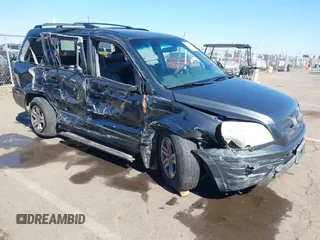2003 Honda Pilot EX z VIN 2HKYF18573H561732, wystawiony jako IAAI lot #42180612 z przebiegiem 225 625 mil mil oraz . Historia ofert i sprzedaży dostępna na DreamBid. Obrazek 1.