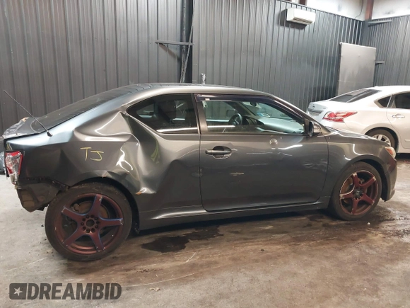 2012 Scion tC with VIN JTKJF5C7XC3034998, listed as a IAAI auction lot 41591632 with 171,121 mi miles. Bid and sale history available at carsss.com. Image 13.