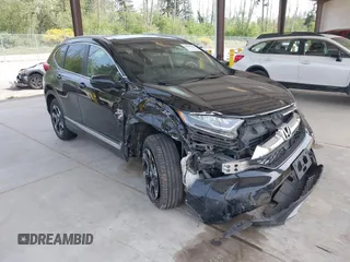 2018 Honda CR-V Touring with VIN 2HKRW2H92JH626786, listed as a IAAI auction lot 42229248 with 151,221 mi miles and . Bid and sale history available at DreamBid. Image 1.