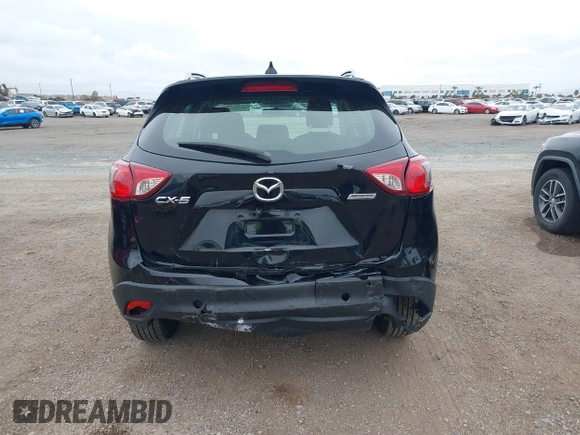 2016 Mazda CX-5 Sport with VIN JM3KE2BY4G0761933, listed as a IAAI auction lot 41709274 with 131,127 mi miles. Bid and sale history available at carsss.com. Image 17.
